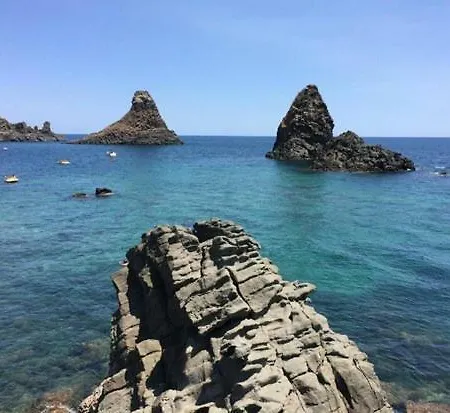 Holiday Acitrezza Beach
